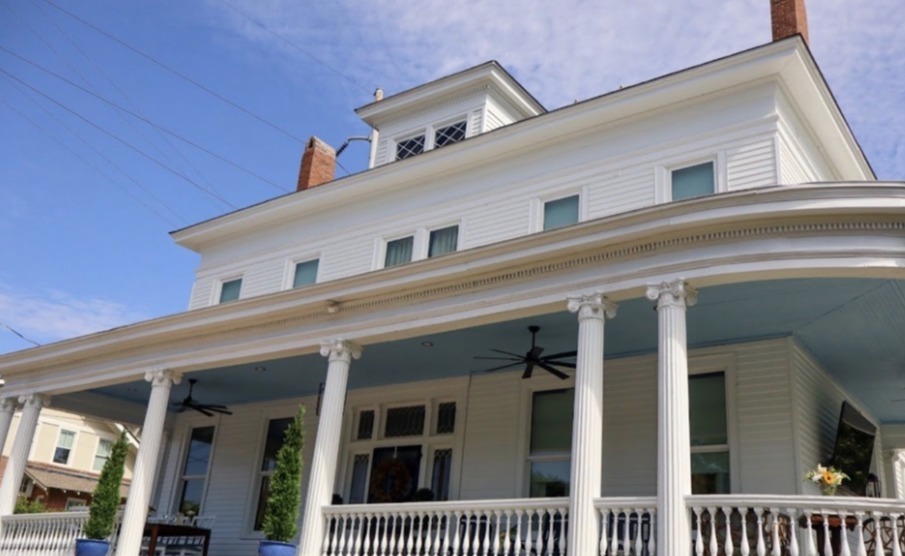 Mulligan’s on the Hill, with its columned wraparound porch