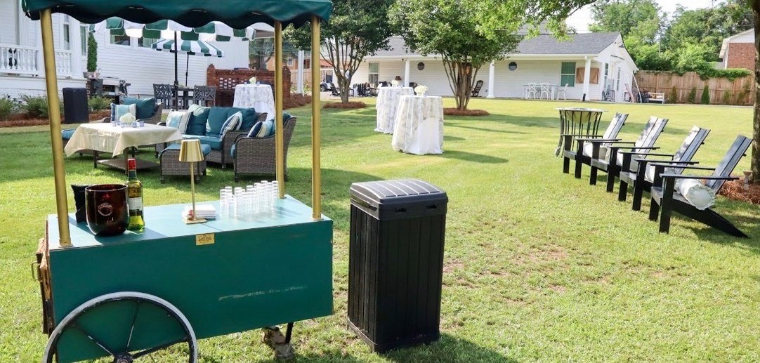 Bar cart and lounge seating on the lawn